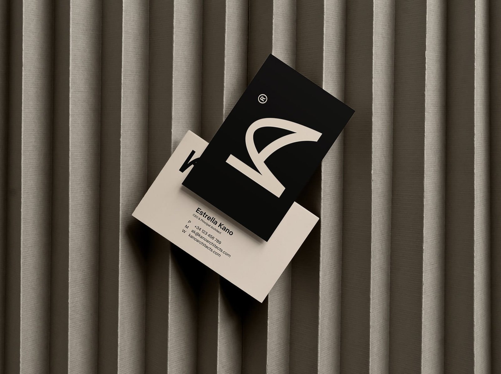 Business cards pairing understated design with precise typography on quality paper